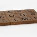 scrabble, scrabble pieces, lettering, letters, wood, scrabble tiles, white background, words, quote, letters, type, typography, design, layout, focus, bokeh, blur, photography, images, image, slow down, don't rush, less haste more speed, rush, panic, do not panic, relax, breathe, concentrate,